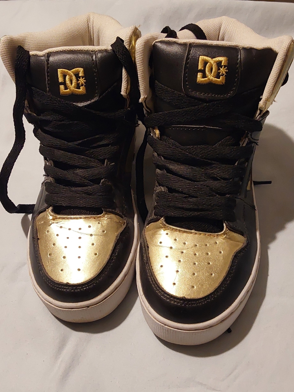 DC Kids Black and Gold High-Top Skate Sneakers